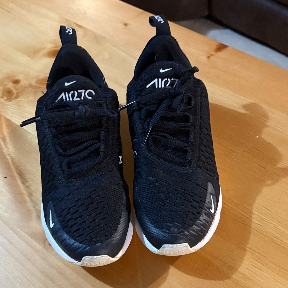 Nike Air 270 Black Athletic Shoes have small tear in front toe mesh